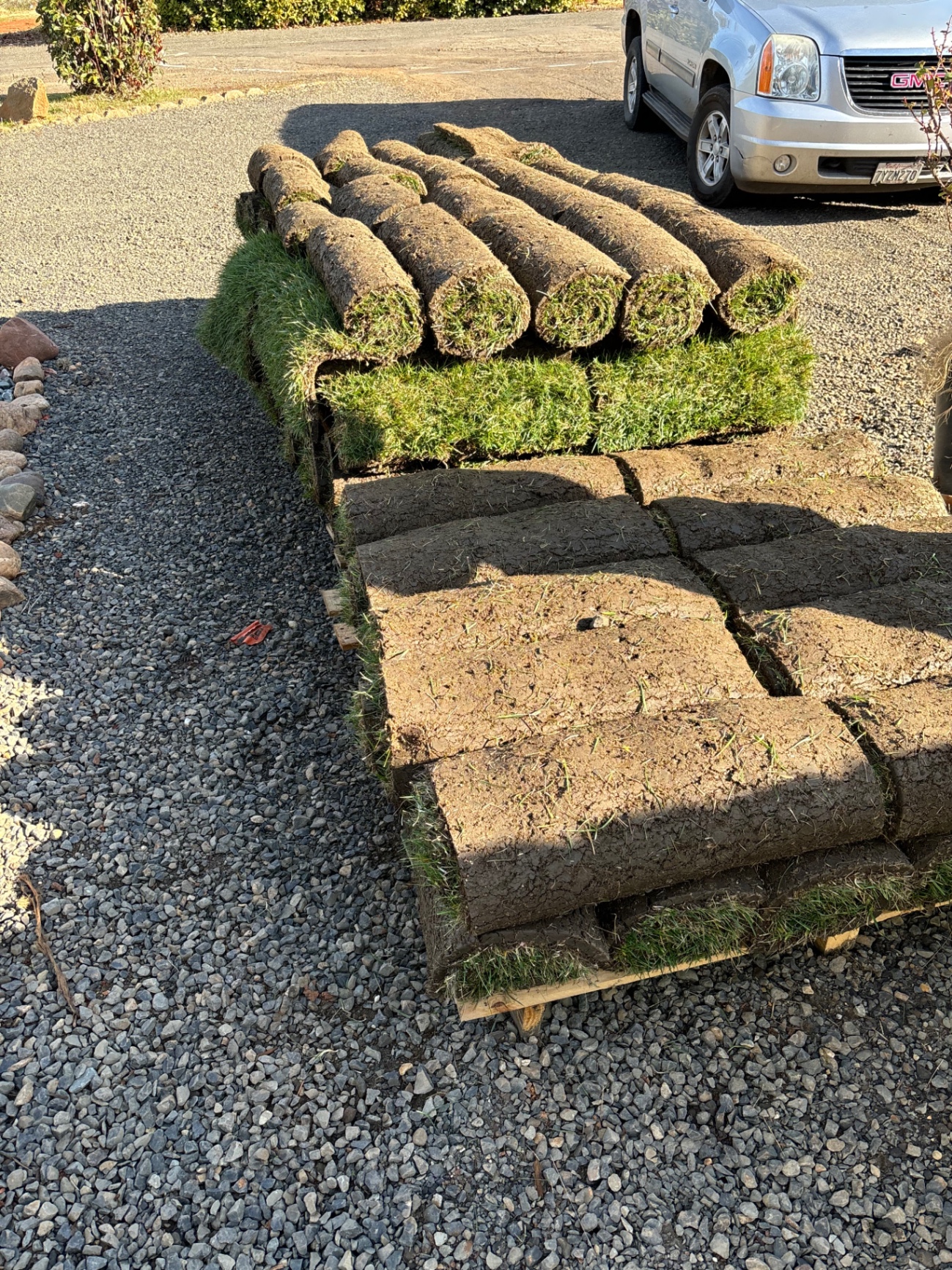 Fresh sod staged for installation on a Biggs, CA valley lot